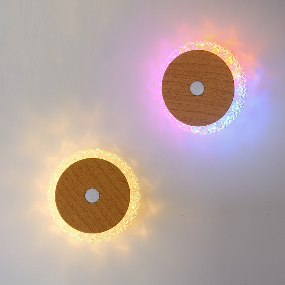 Smart Rechargeable Motion-sensor Wall Light Bedside Night Light in two color options with glowing features.